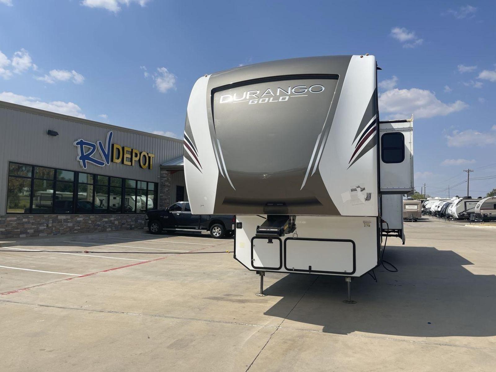 2020 K-Z DURANGO GOLD 366FBT (4EZFV4026L6) , Length: 39.83 ft. | Dry Weight: 11,470 lbs. | Gross Weight: 14,500 lbs. | Slides: 3 transmission, located at 4319 N Main St, Cleburne, TX, 76033, (817) 678-5133, 32.385960, -97.391212 - Travel and enjoy the luxuries this 2020 K-Z Durango Gold 366FBT has to offer! This fifth wheel measures almost 40 feet long and 13.5 feet tall. It has a dry weight of 11,470 pounds as well as a GVWR of 14,500 pounds. It comes equipped with three power slides and an 18-foot power awning. This unit is - Photo #0